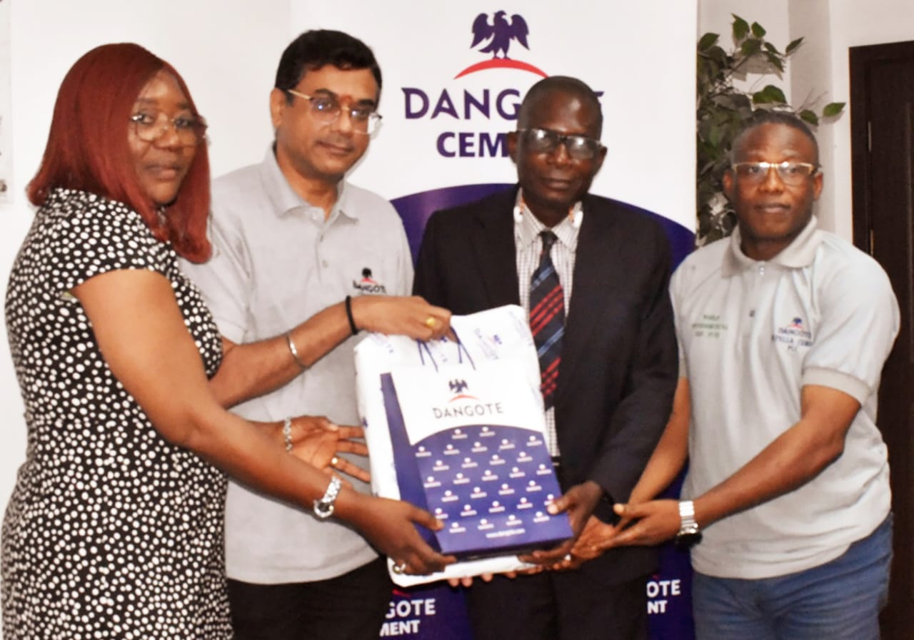 Mrs. Oluwaseun Olajube, Director of Field Operations OGIRS (left) and Mr. Zaka Oladele, Director of Tax Operations OGIRS (2nd right); being presented with Dangote souvenirs by the Plant Director, Mr. Ayyagari Subbaraidu (2nd left) and assisted by Mr. Emmanuel Abe, Head Finance (right).